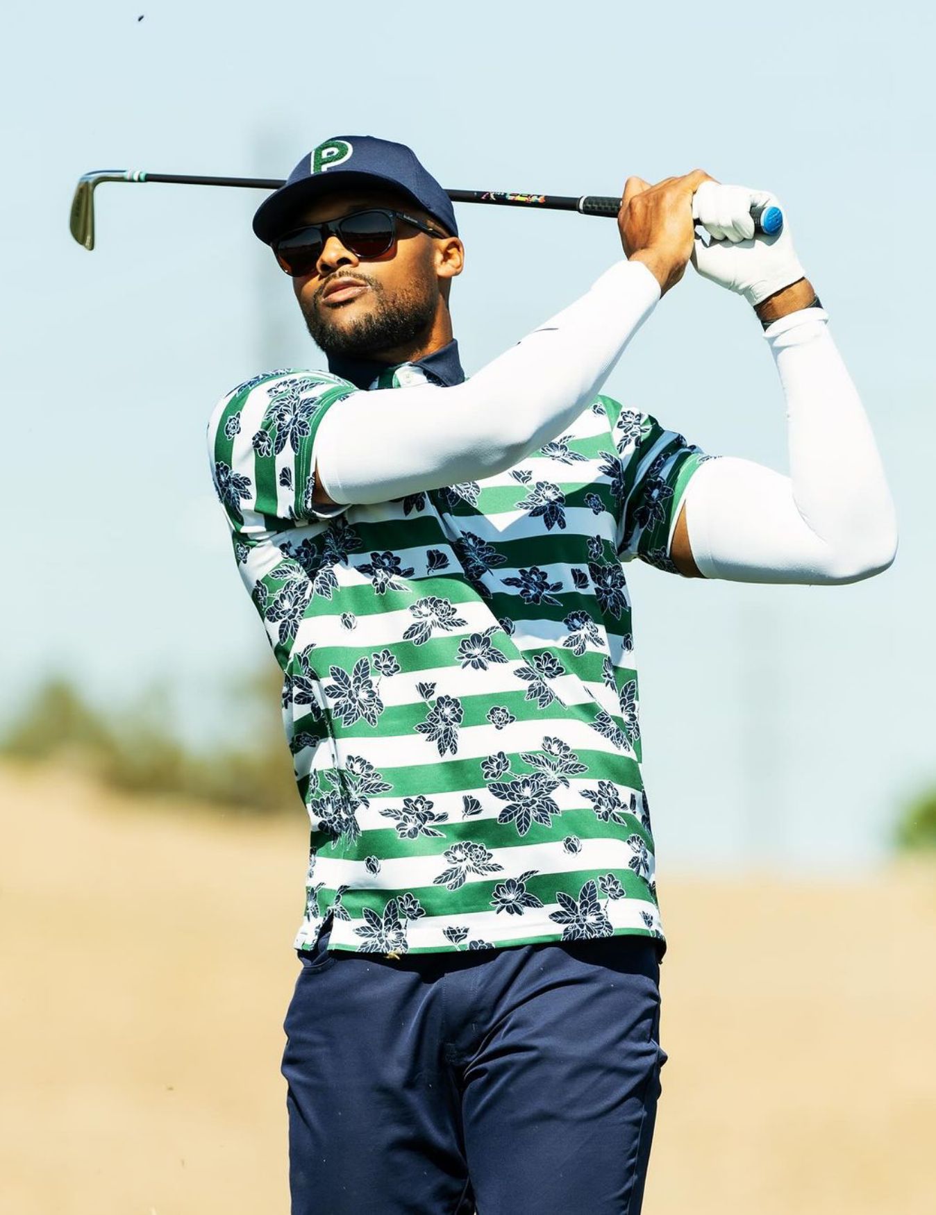 Brice Butler swings the golf club.